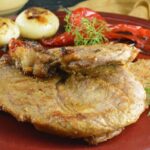 Grilled Veal Steak with Peppers and Onions